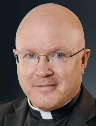 Péré Roger J. Landry